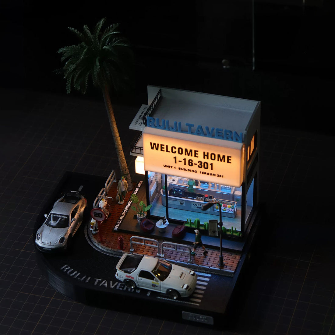 1/64 scale urban diorama building with illuminated coffee shop scene